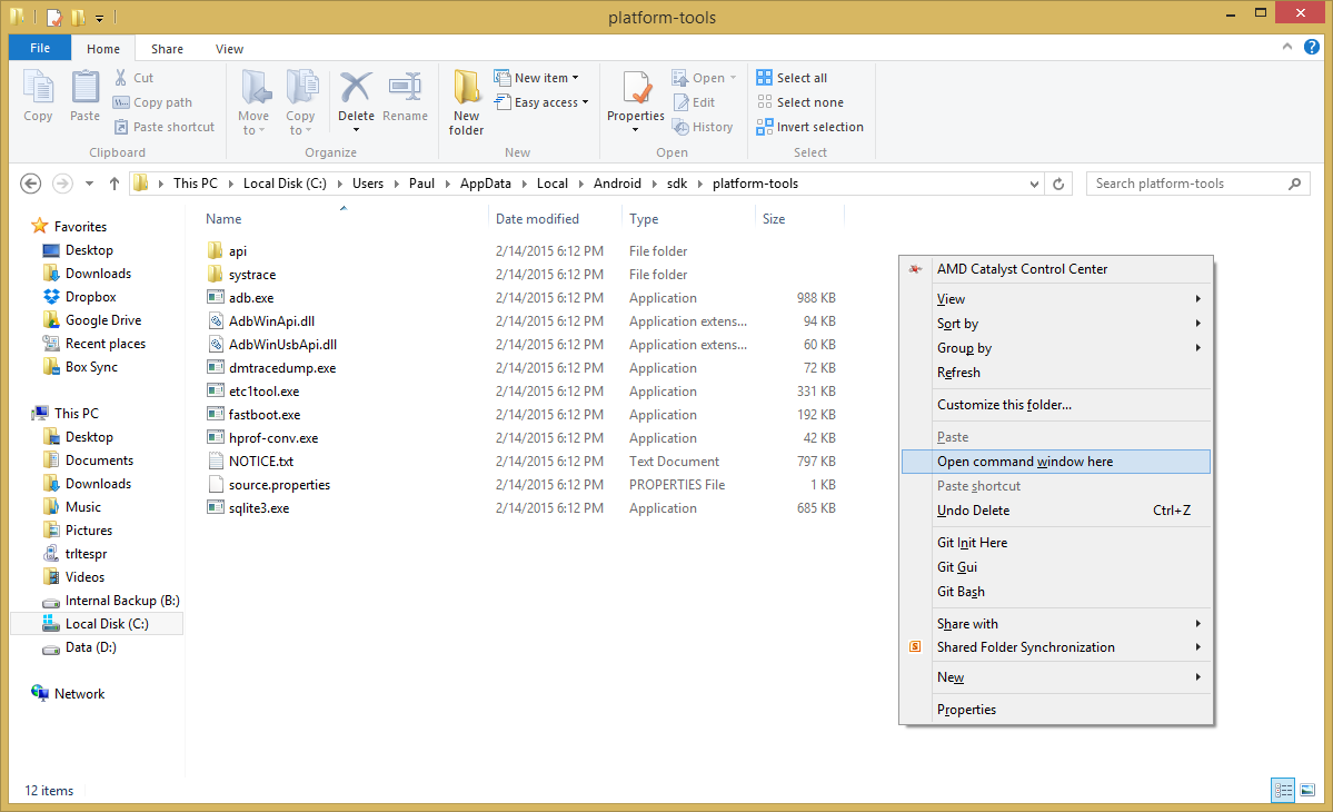windows explorer in the folder listed above, showing the &ldquo;adb.exe&rdquo; file, with the right click menu open with the &ldquo;Open command window here&rdquo; option highlighted